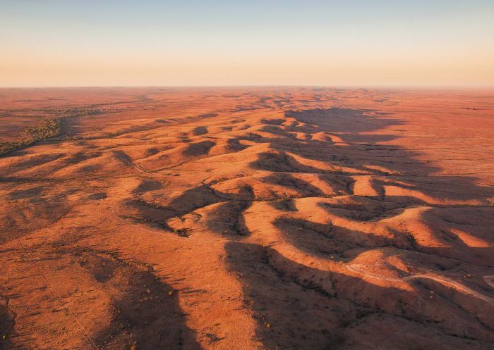 Mundi Mundi Plains near Silverton - Broken Hill Sun rising over the Mundi Mundi Plains near Silverton, Broken Hill